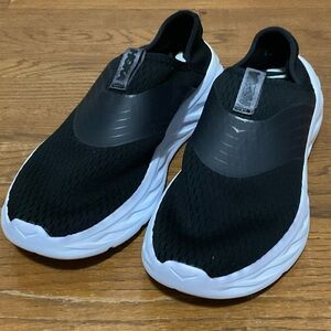 Hoka One One Black and White Slip-On Sneakers
